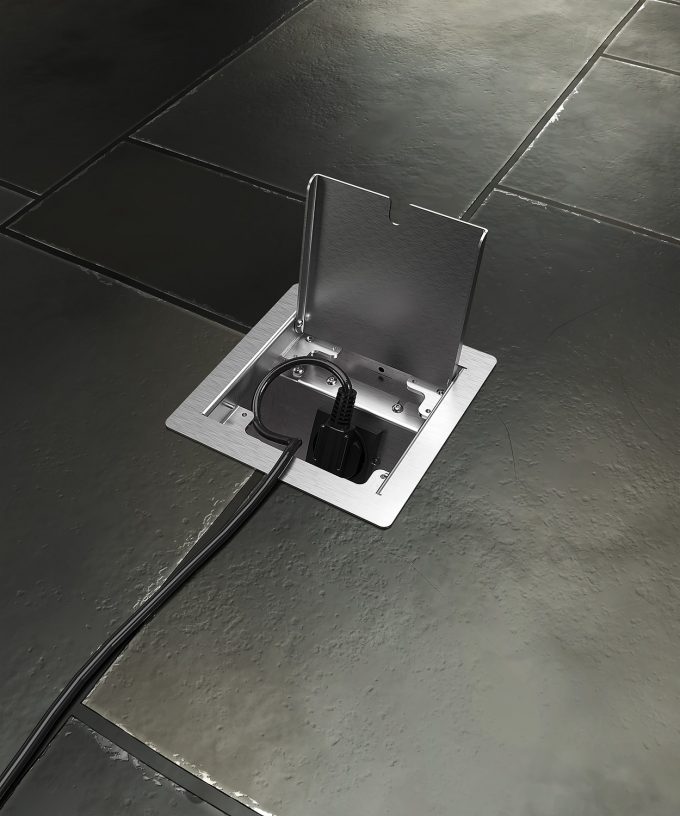 raised access floor socket 8501E built in floor lid opened cable plugged in